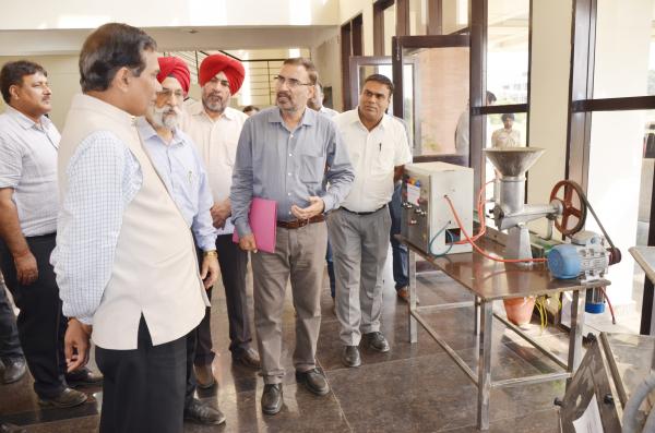 Dr. A. S. Nanda, Vice Chancellor, Dean, College of Dairy Science & Technology and other officers brief the exhibit stall  to Dr. Trilochan Mohapatra, DG, ICAR on the visit of University on dated 8-10-2018